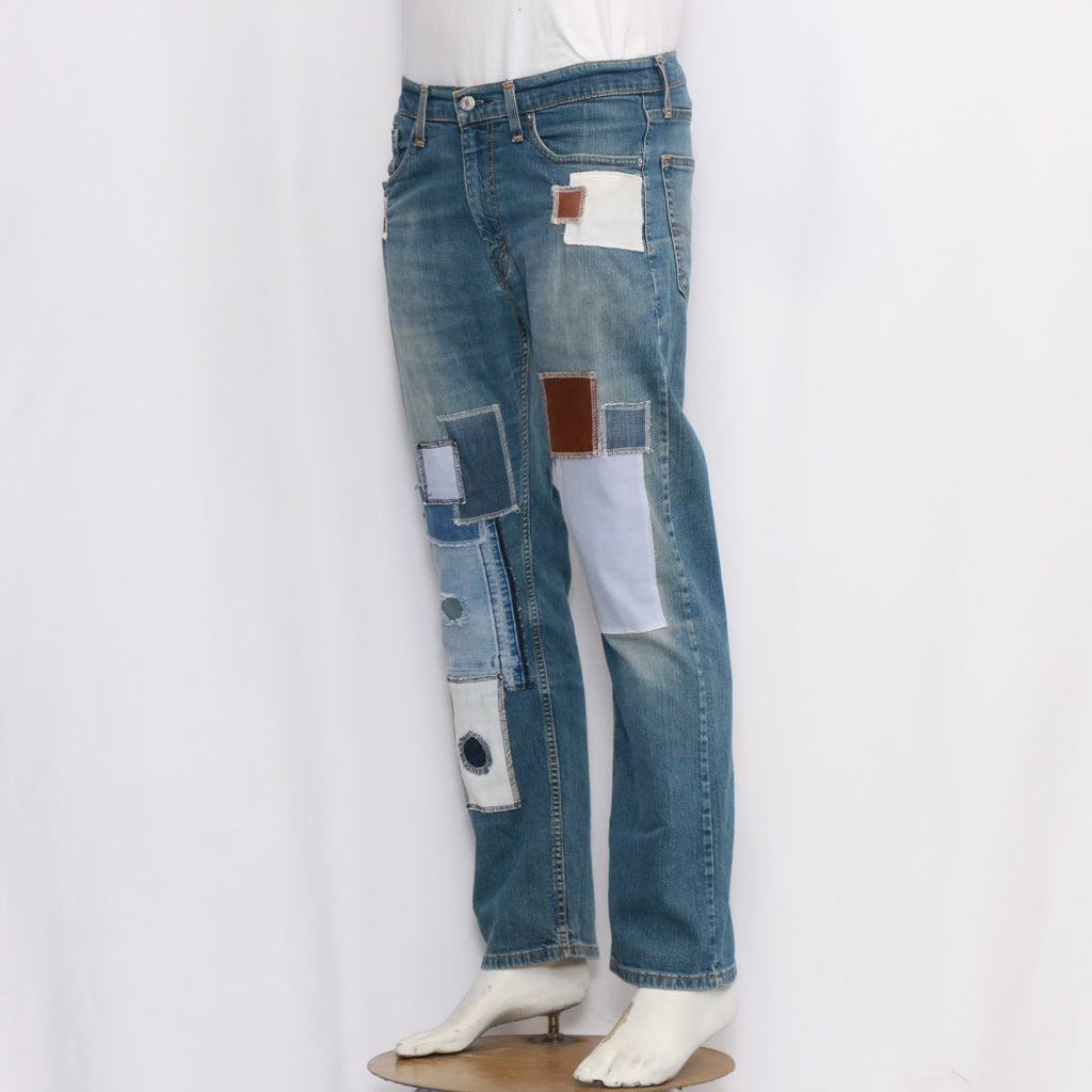 CR064 Men Reworked Denim Trouser Feature A Patchwork Design