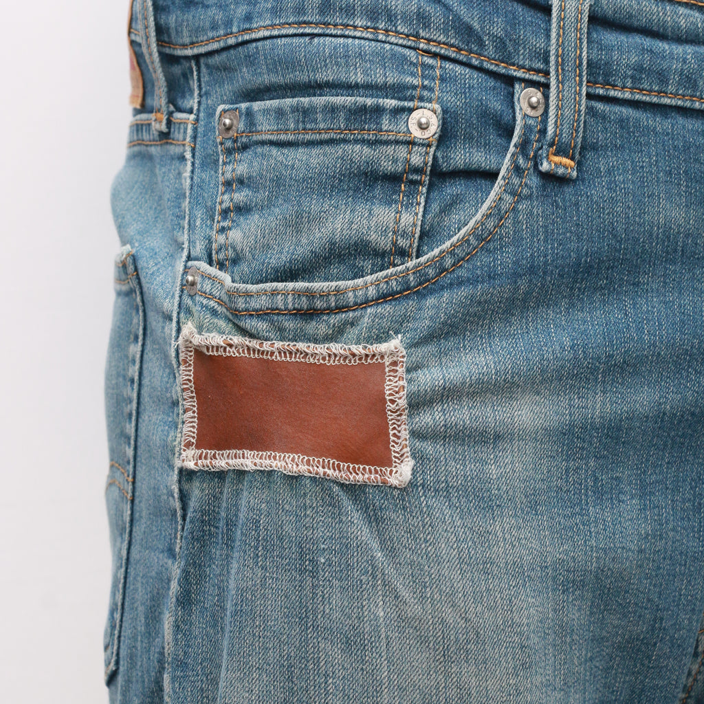 CR064 Men Reworked Denim Trouser Feature A Patchwork Design