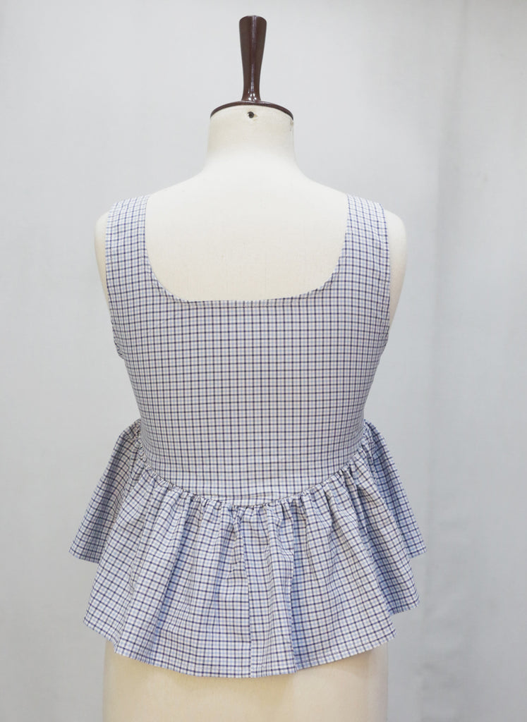 CR2212 UPCYCLED POLO CHECK PEPLUM TOP