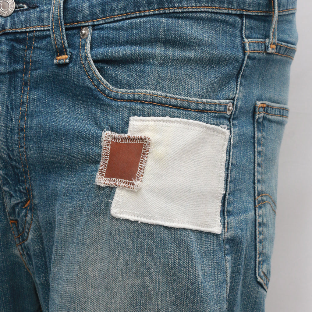 CR064 Men Reworked Denim Trouser Feature A Patchwork Design