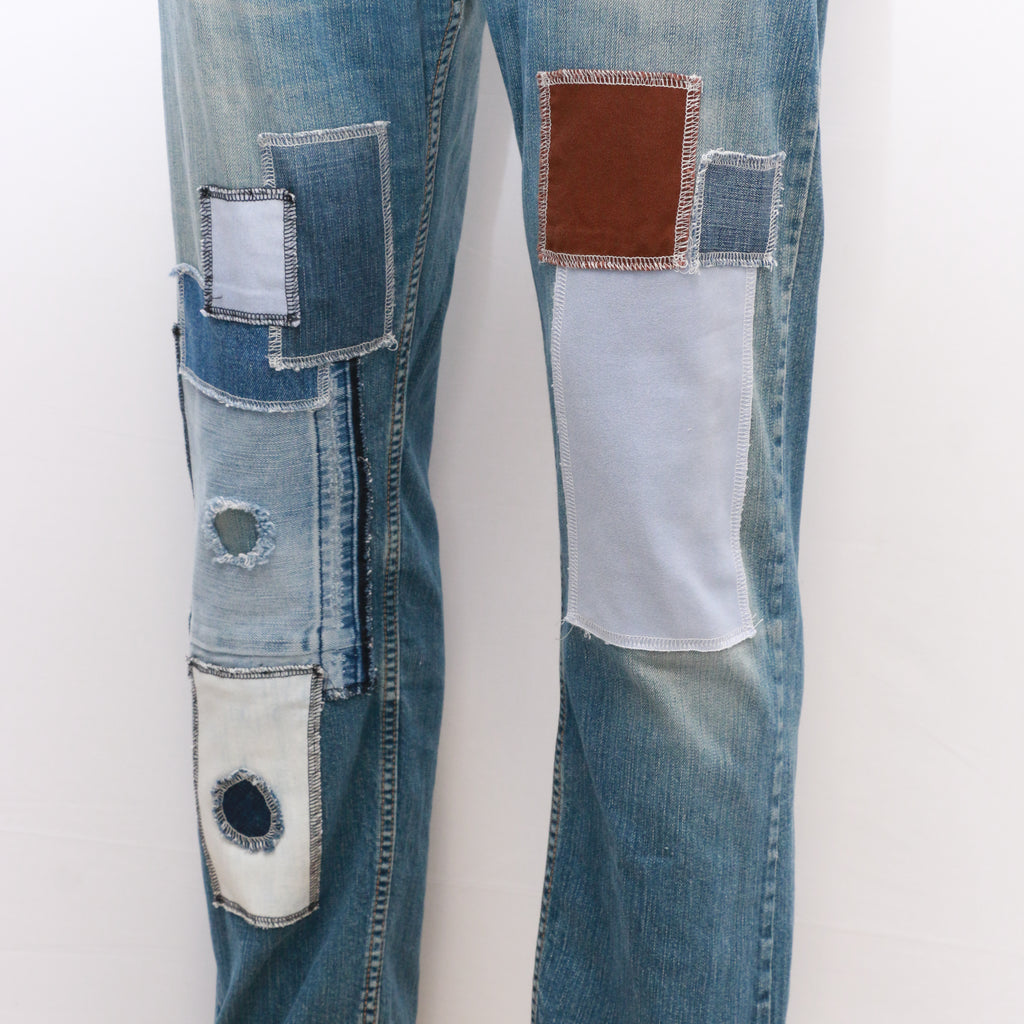CR064 Men Reworked Denim Trouser Feature A Patchwork Design