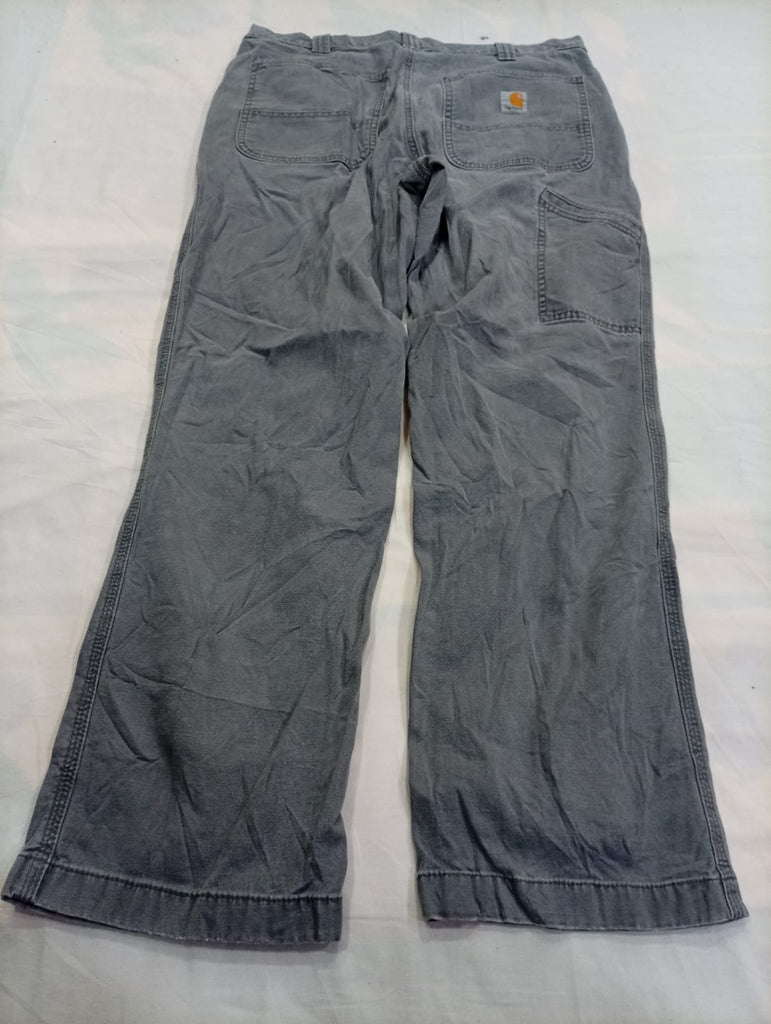 Vintage Carhartt Carpenter Trousers Bundle in mixed sizes and colours. Grade C.